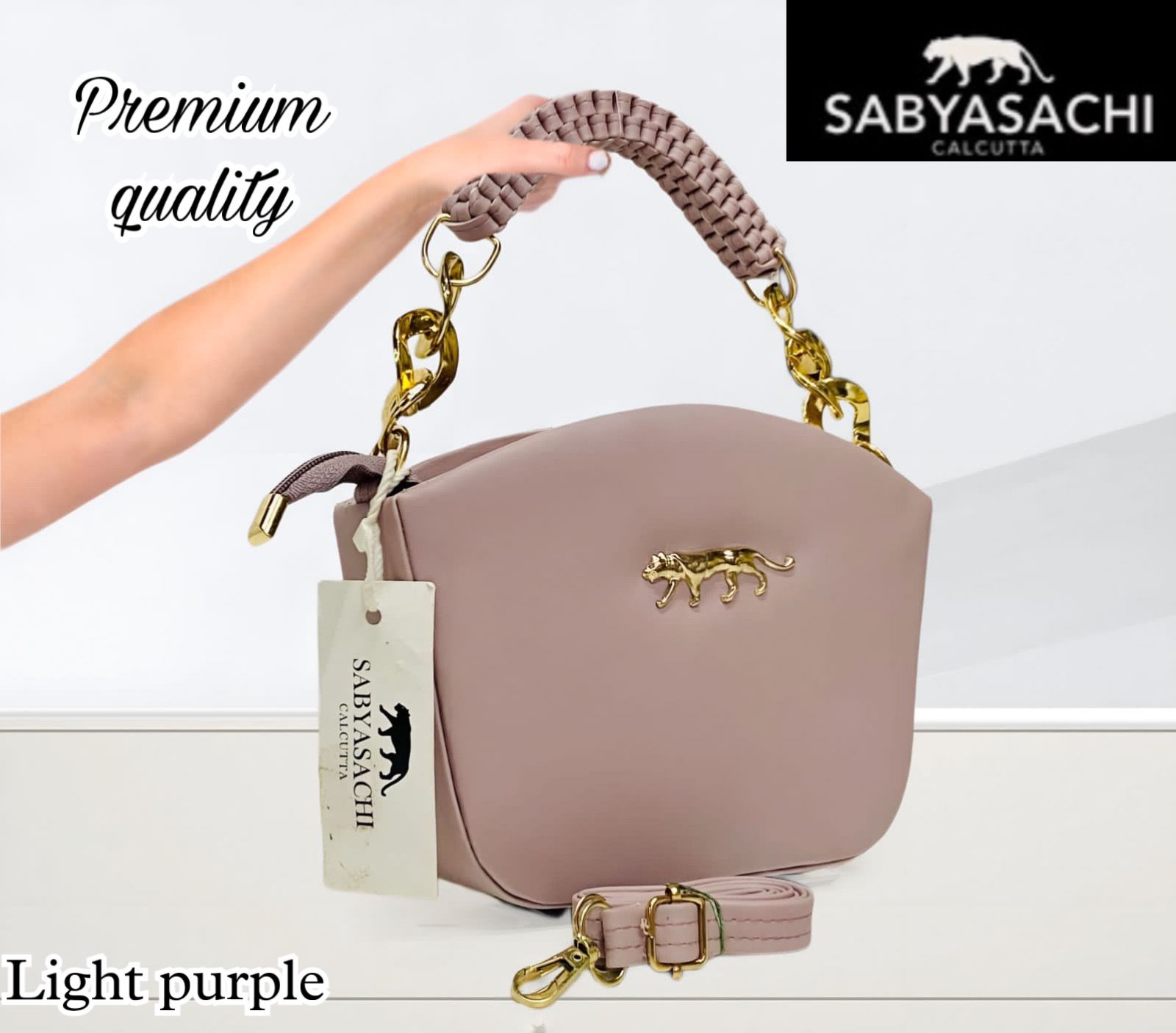 Regal Radiance: Sabyasachi Sling Bag with Weaved Handle